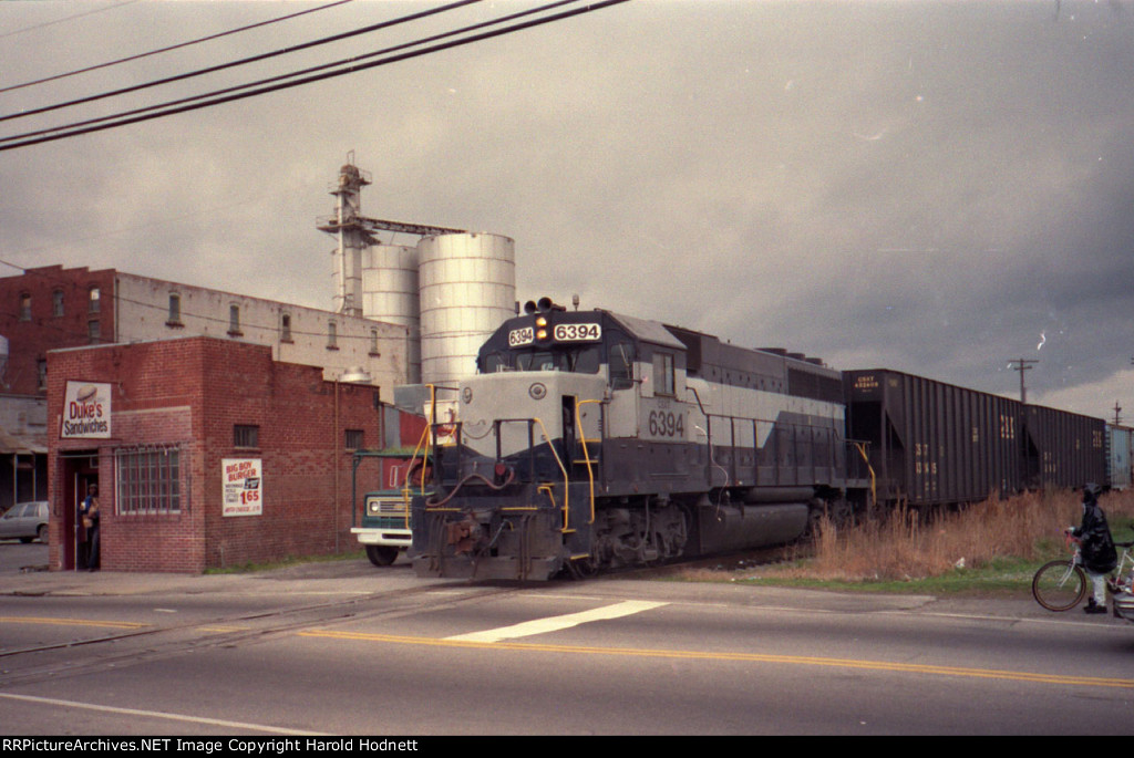 CSX 6394 leads a local thru town